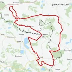 Mapa z zaznaczoną na czerwono żelazną trasą rowerową, biegnącą przez tereny zurbanizowane i zielone, w okolicach Karwiny i Jastrzębia-Zdroju.