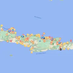 Mapa Krety z zaznaczonymi atrakcjami, idealna do stworzenia własnego planu zwiedzania. Ikony wskazują miejsca do odwiedzenia.