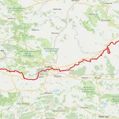 Mapa przedstawia przebieg wiślanej trasy rowerowej Kraków – Sandomierz, z zaznaczonymi miastami i parkami krajobrazowymi.