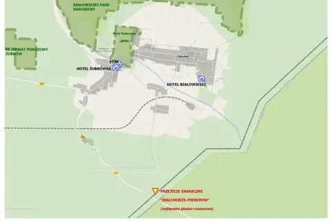 Mapa Białowieży z zaznaczonymi atrakcjami: Rezerwat Żubrów, Park Pałacowy, PTTK, Hotele Żubrówka i Białowieski, przejście graniczne. Twój białowieża plan zwiedzania.