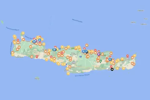 Mapa Krety z zaznaczonymi atrakcjami, idealna do stworzenia własnego planu zwiedzania. Ikony wskazują miejsca do odwiedzenia.