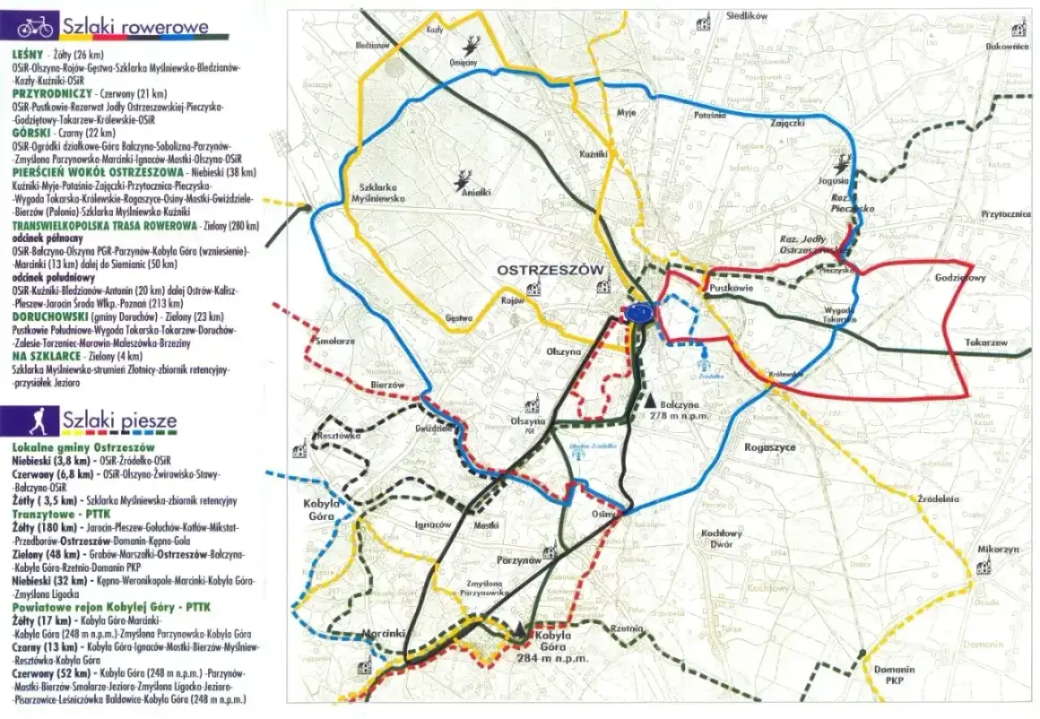 Mapa pokazuje trasy rowerowe i piesze wokół Ostrzeszowa, w tym szlaki oznaczane kolorami i nazwami, np. "trasy rowerowe karpacz" nie występują na mapie.